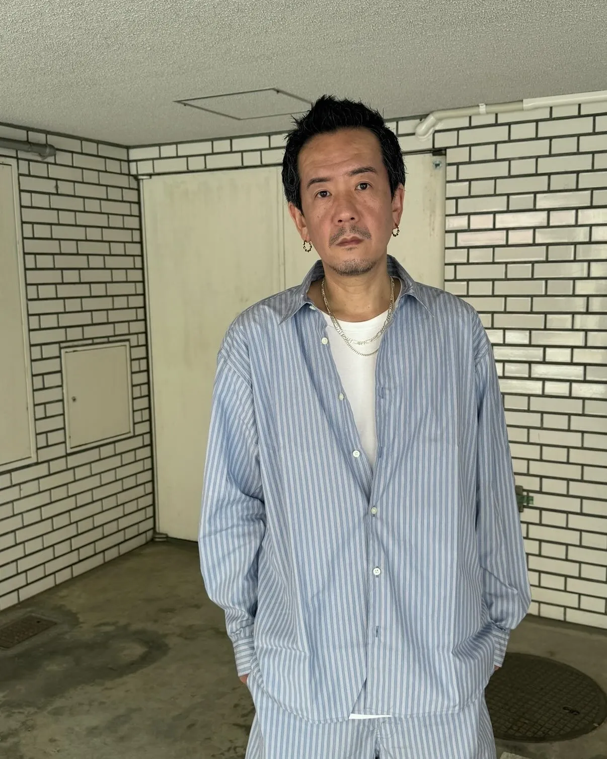 『SON OF THE CHEESE』のストライプのシャツ生...