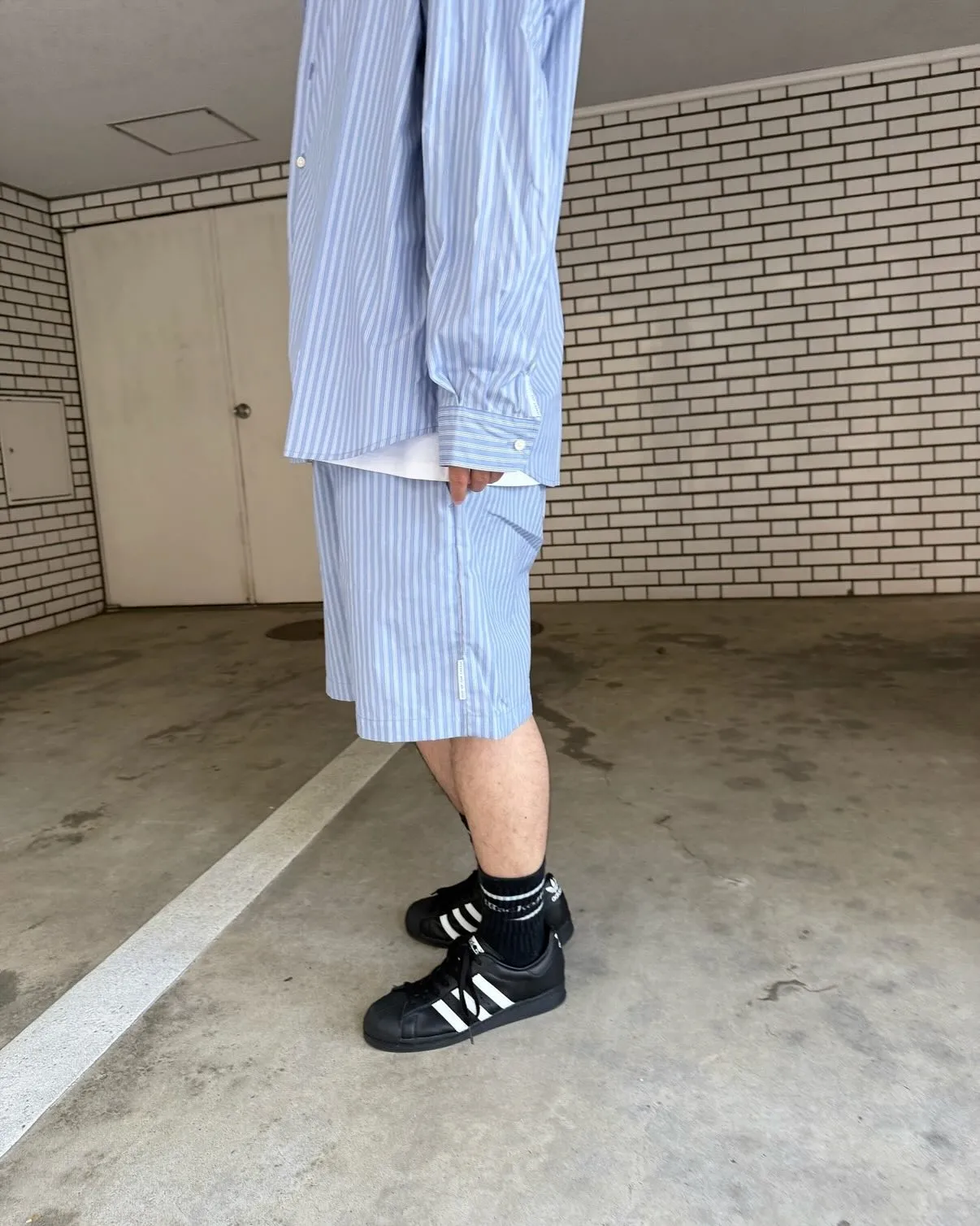『SON OF THE CHEESE』のストライプのシャツ生...