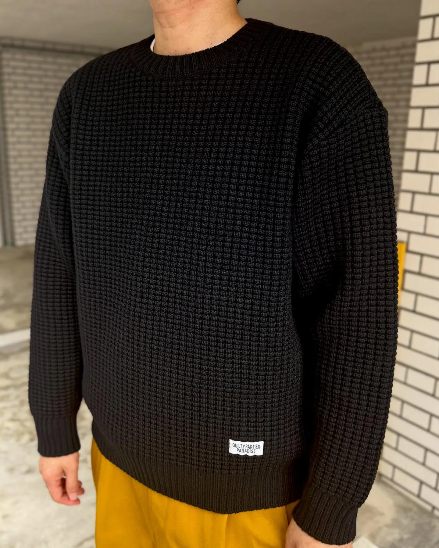 WACKO MARIAのワッフルニットとツータックチノのコー...
