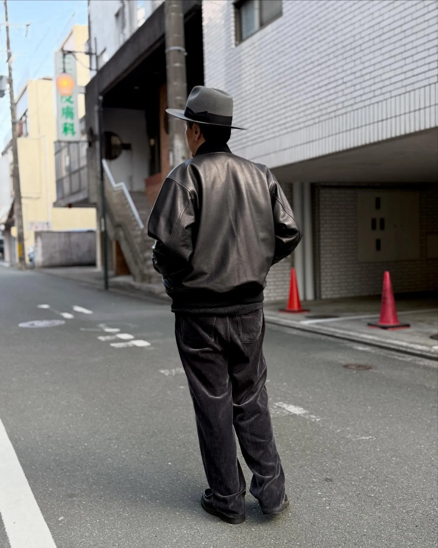 WACKO MARIAのレザーのバーシティジャケット。